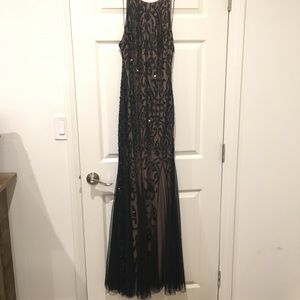 Black sequin evening dress.